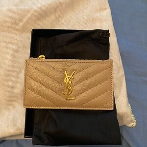 Saint Laurent NEW zip around card case in dark beige. Comes with box and dustbag